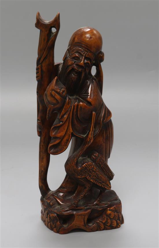 A Chinese rootwood carving of a sage height 24cm